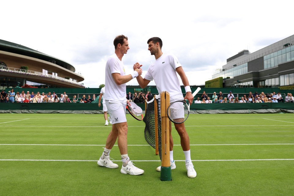 LONDON, ENGLAND - JULY 01: Andy Murray of Great Britain and Novak Djokovic of Serbia shake hands after a practice session ahead of The Championships - Wimbledon 2023 at All England Lawn Tennis and Croquet Club on July 01, 2023 in London, England. (Photo by Clive Brunskill/Getty Images)