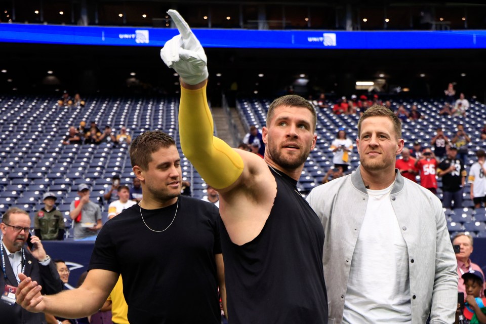 HOUSTON, TEXAS - OCTOBER 01: Former Pittsburgh Steelers player Derek Watt, T.J. Watt #90 of the Pittsburgh Steelers, and Houston Texans player J.J. Watt look on prior to a game between the Pittsburgh Steelers and the Houston Texans at NRG Stadium on October 01, 2023 in Houston, Texas. (Photo by Carmen Mandato/Getty Images)