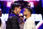 LOS ANGELES, CALIFORNIA - MARCH 10: Ryan Garcia and Rolly Romero face off  during a press conference at The Mayan on March 10, 2025 in Los Angeles, California. (Photo by Cris Esqueda/Golden Boy/Getty Images)