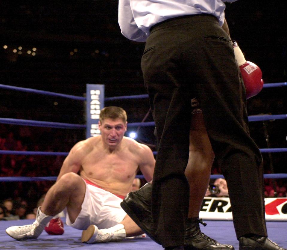 Golota was dropped by a big right hand in the first round and pleaded with his corner to pull him out